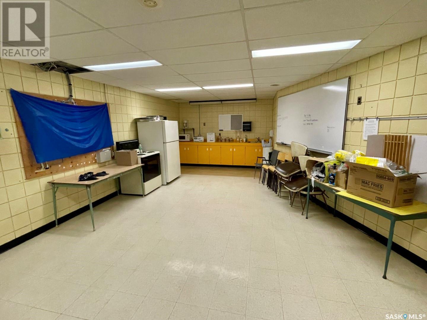 Functional kitchen and food preparation area with appliances and workspace
