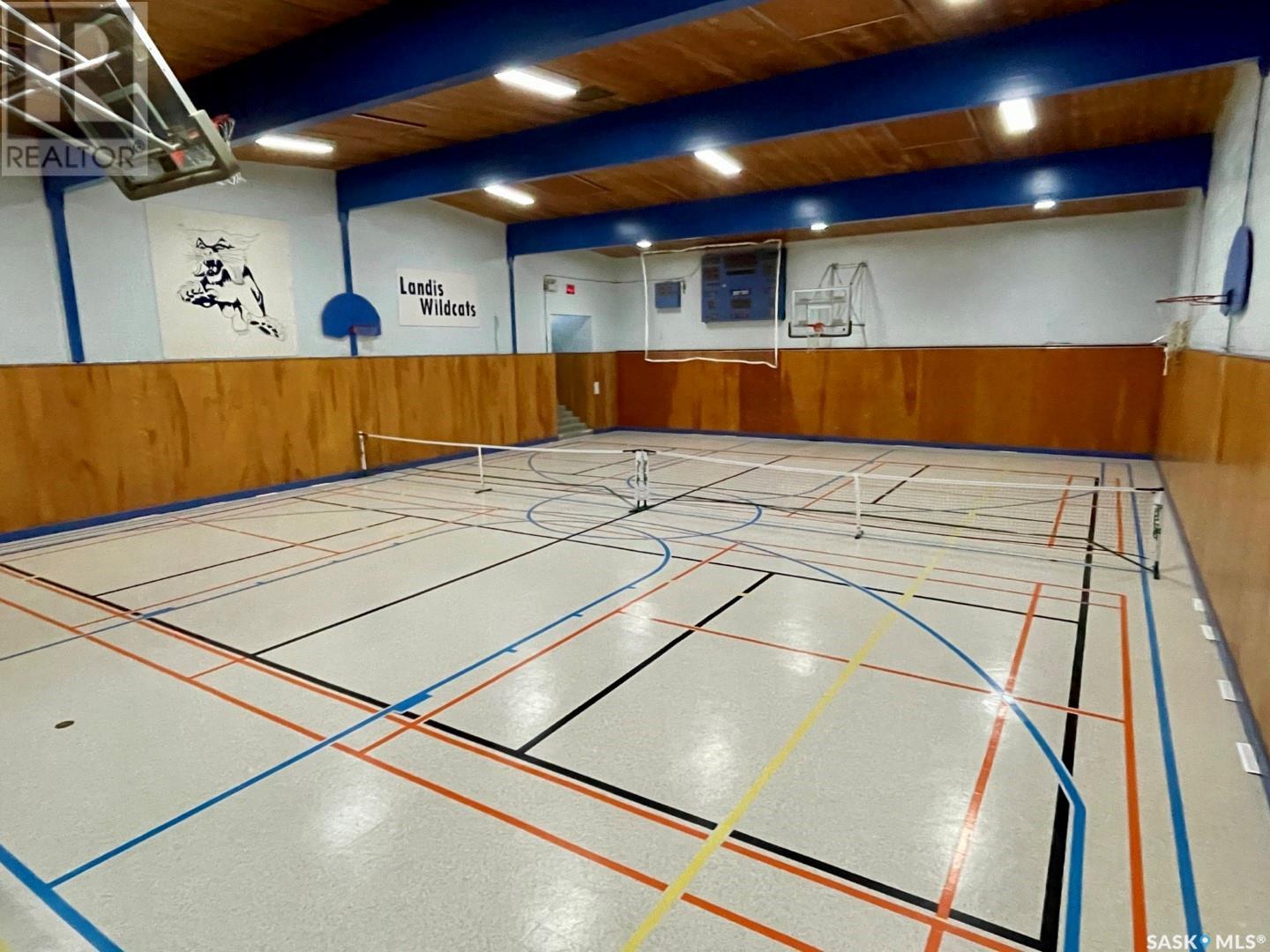 Large gymnasium with basketball court and Landis Wildcats branding